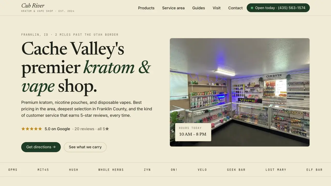 Cub River Kratom & Vape Shop homepage: a warm cream page with the serif headline "Cache Valley's premier kratom & vape shop" in near-black and forest green, forest-green pill buttons, and a photo of the shop's stocked interior.