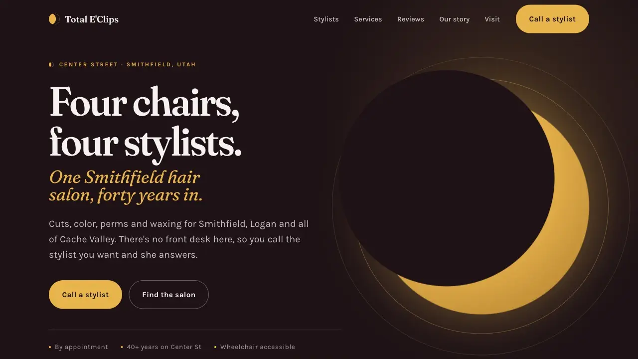 Total E'Clips Salon homepage: a near-black page with a gold eclipse corona and the serif headline "Four chairs, four stylists."
